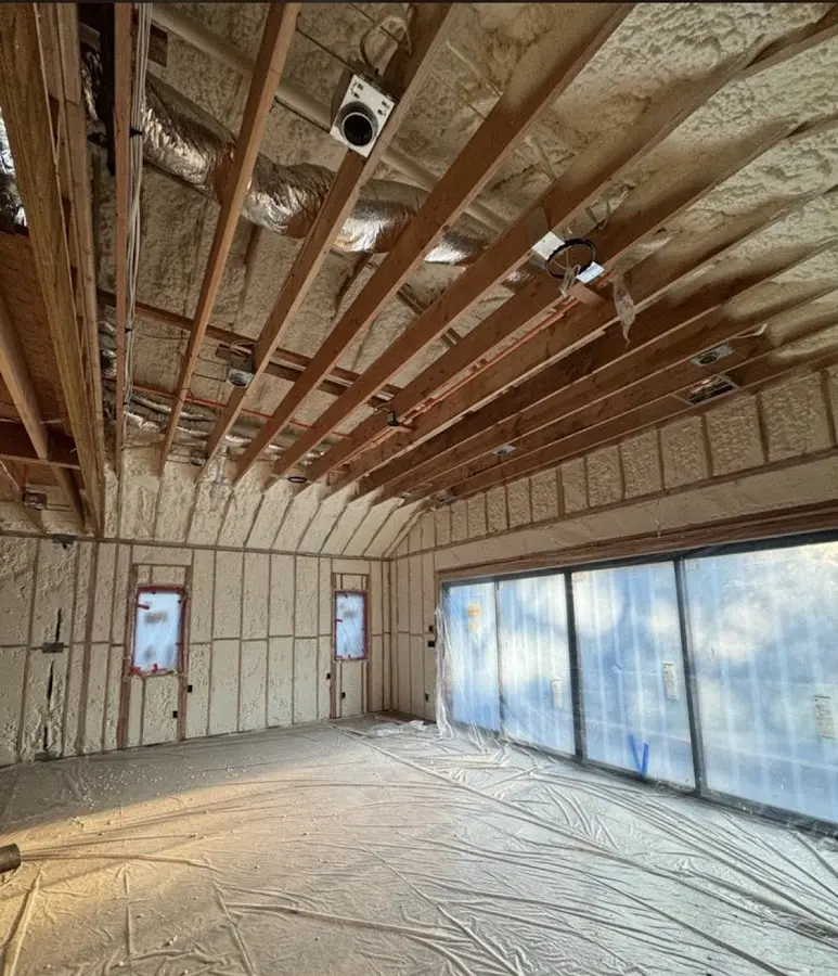 Interior walls and ceiling insulated with spray foam during new construction in Cherryland